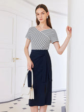 a woman in black pencil skirt